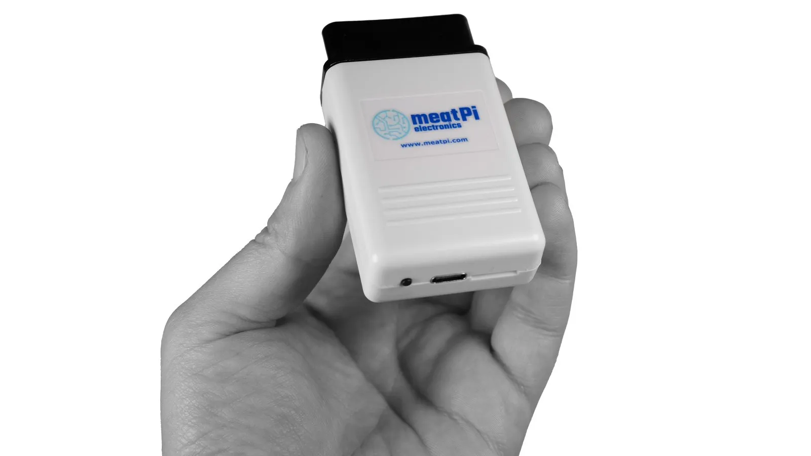 WiCAN PRO held in a hand